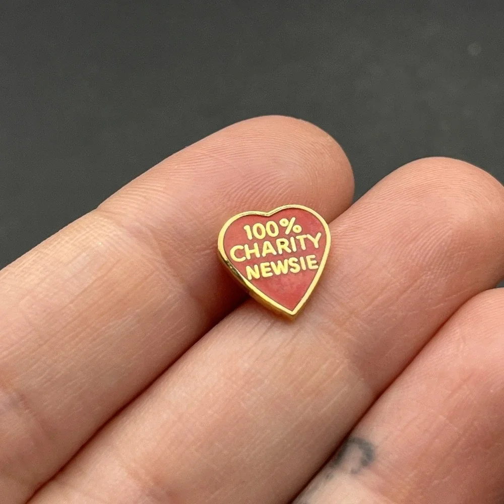 100% Charity Newsie Red Heart Lapel Hat Pin
